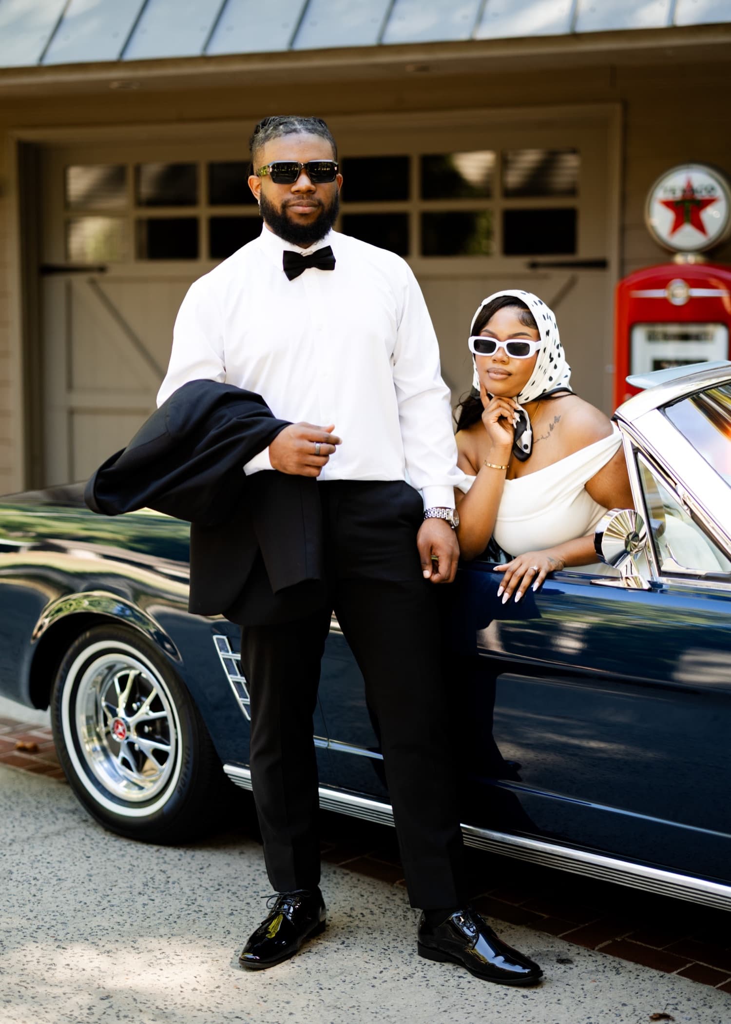 Kijori in a charcoal suit and Amoy in a champagne gown, dressed for a formal evening